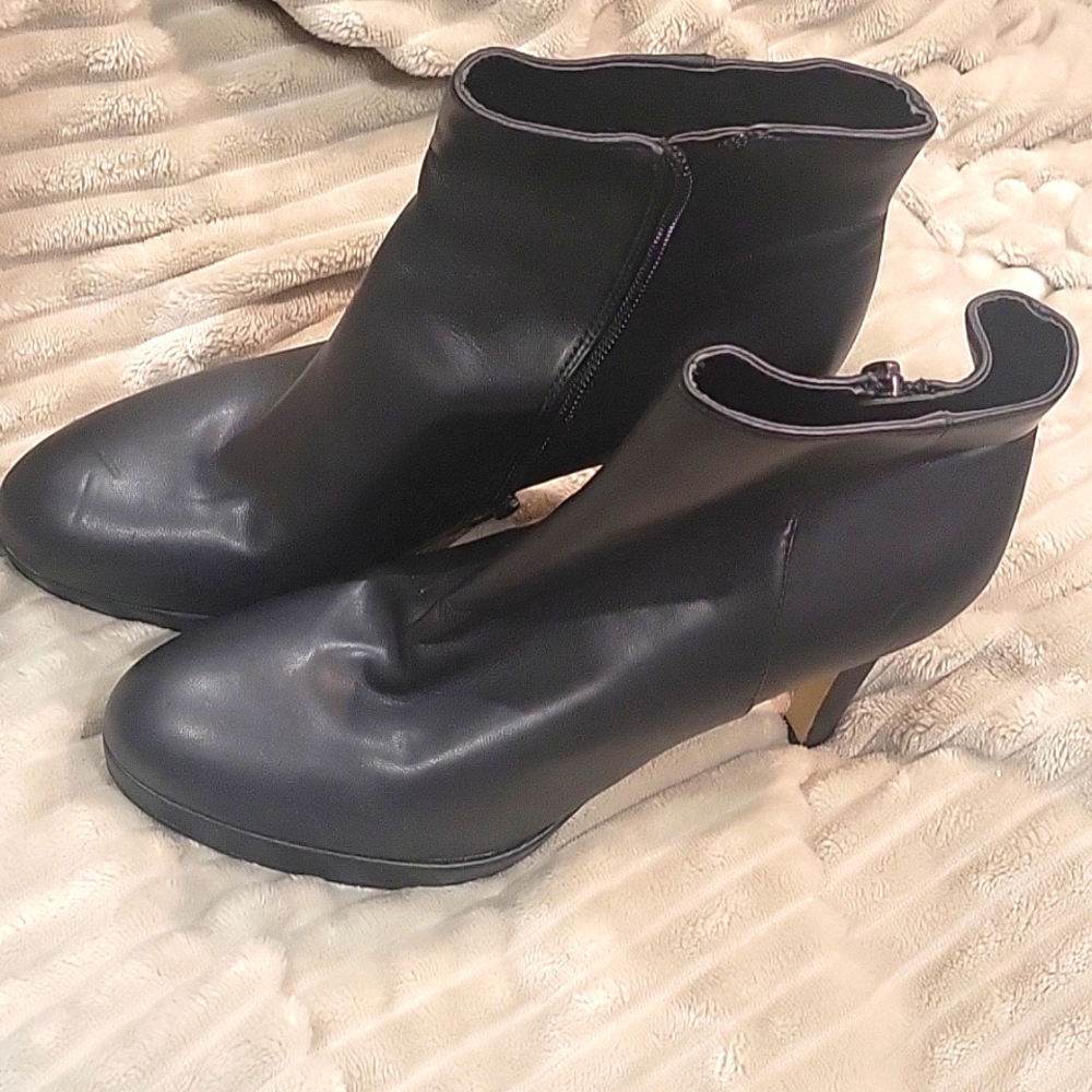 Nine West high heeled boots.